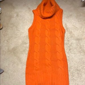 Long sleeveless sweater